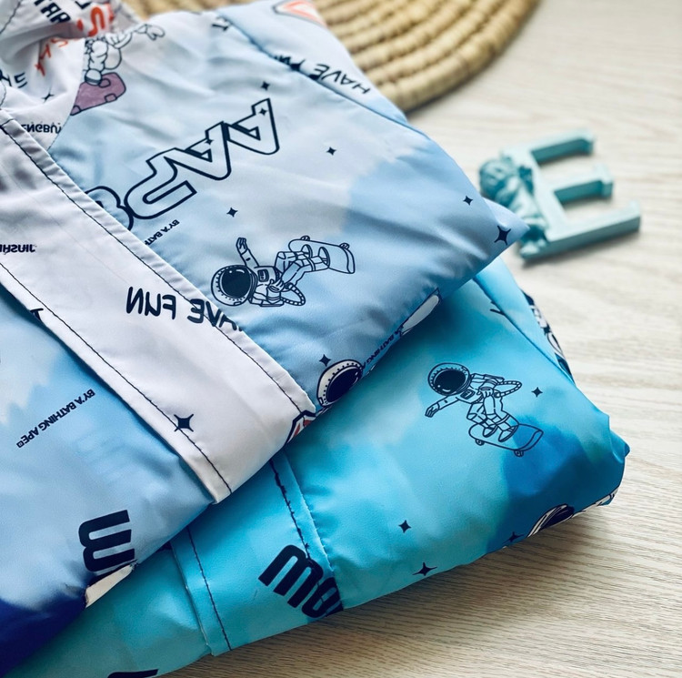 کاپشن بارانی طرح فضانورد